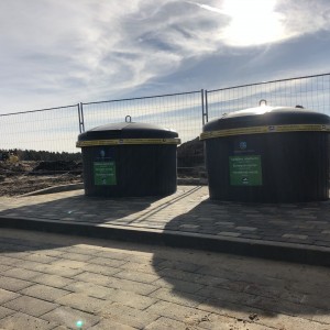 Semi underground waste collection container