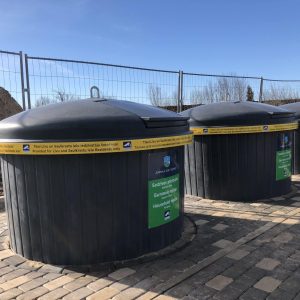 Semi underground waste collection container